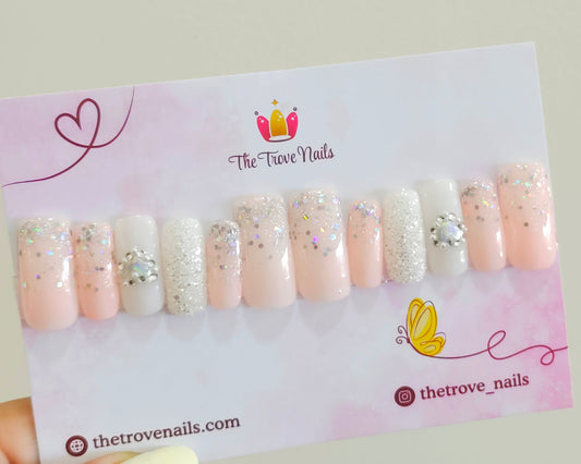 White and Nude Falling Glitter Heart Nails