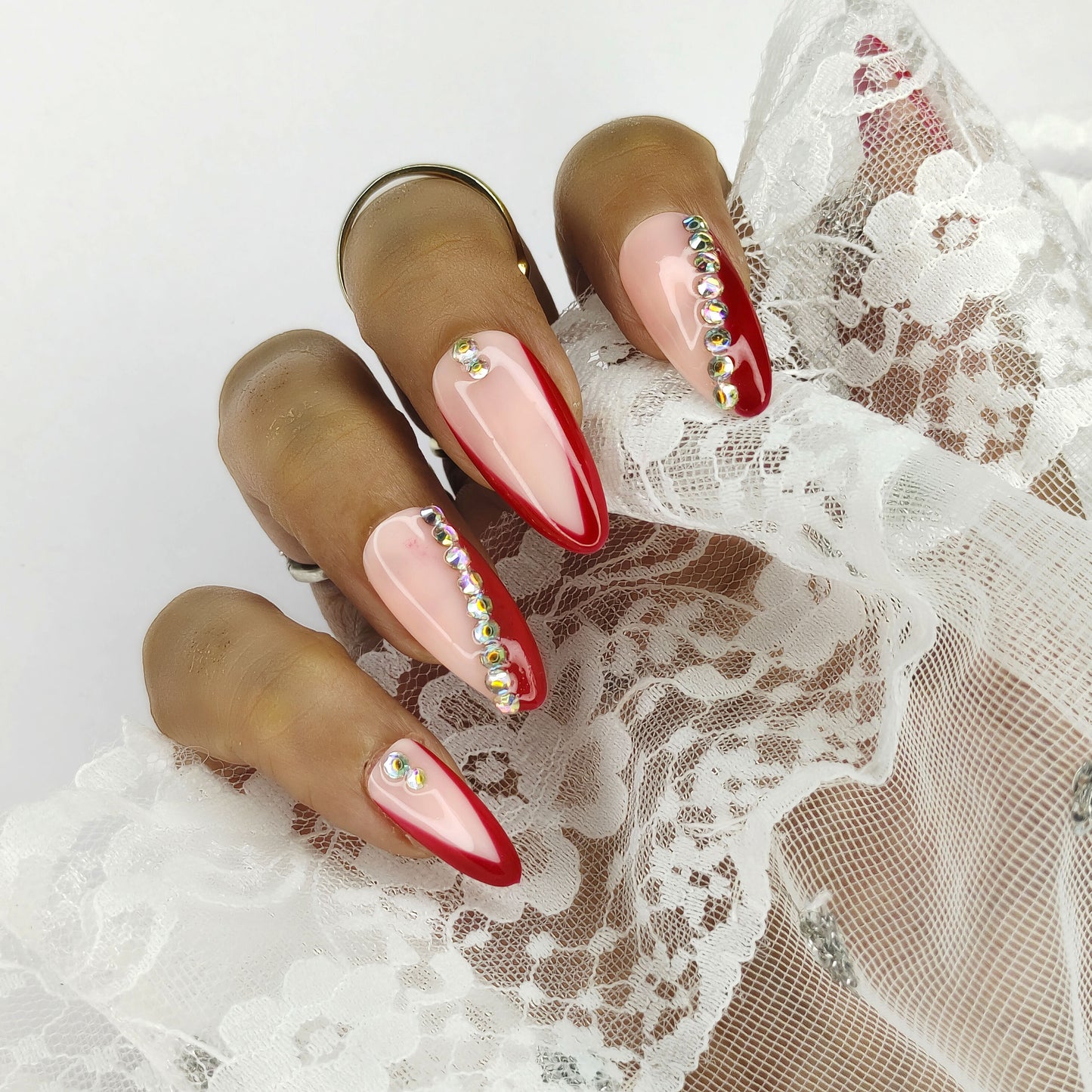 Red Side French Nails with Stone Embellishments