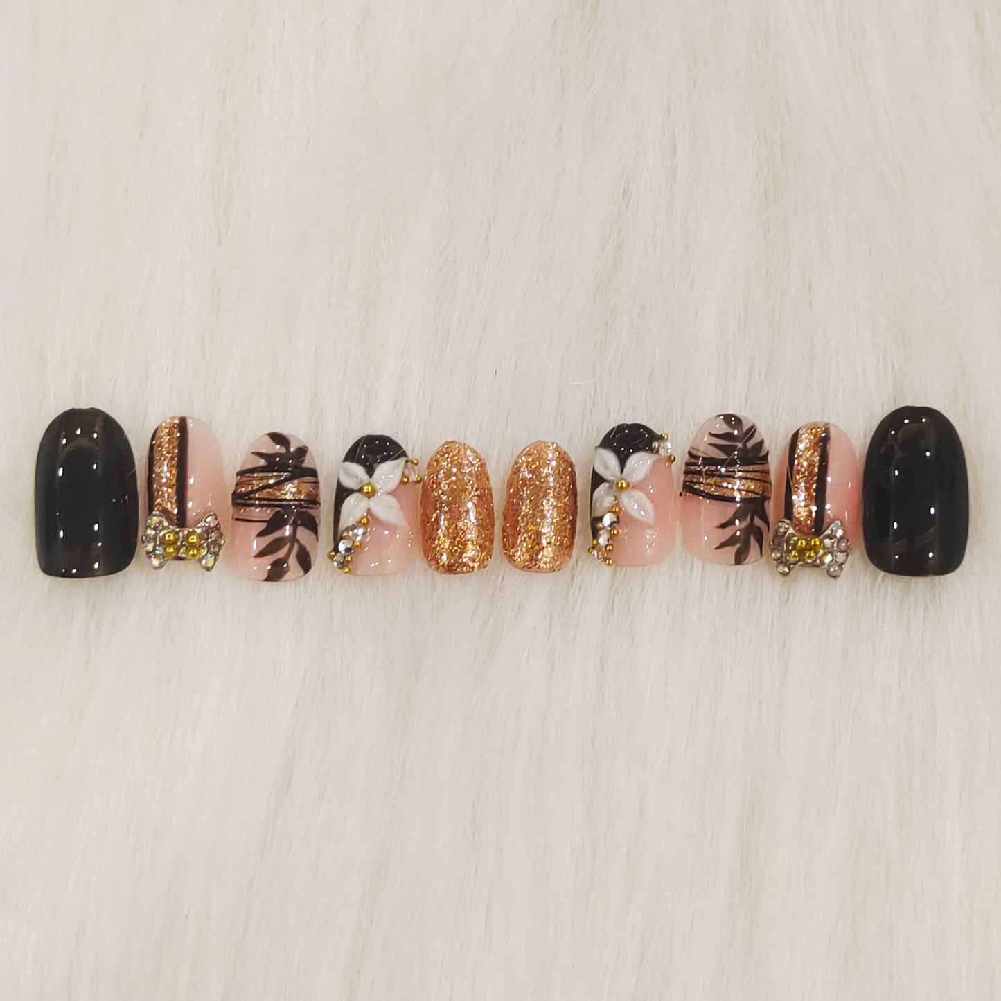 Black and Gold Embellished Nails