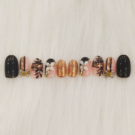 Black and Gold Embellished Nails