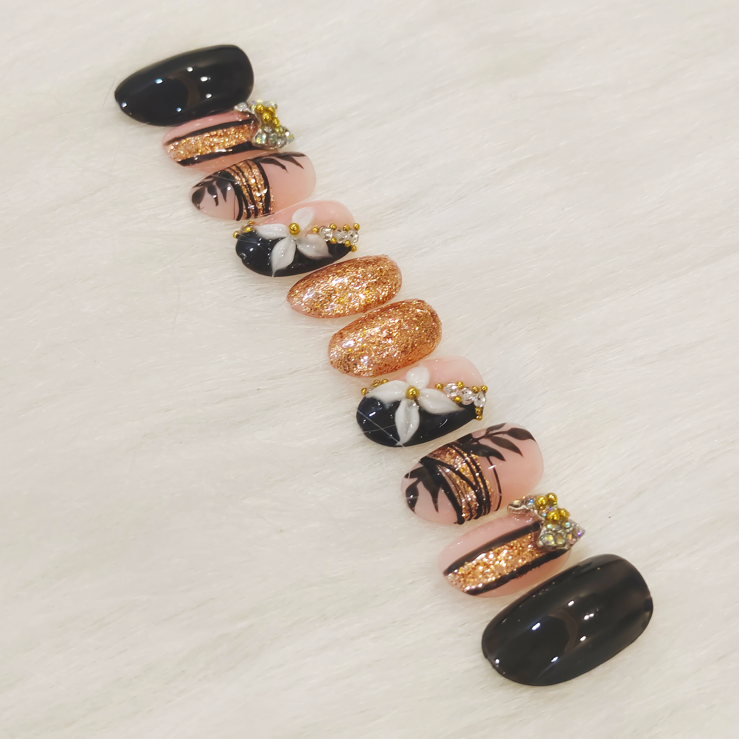 Black and Gold Embellished Nails